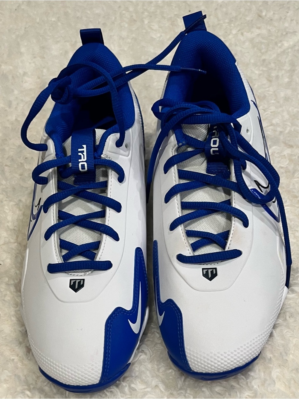 Nike Fast Flex White and Blue Baseball Cleats.